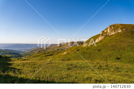 The mountain Bolshoe Sedlo in the Kislovodsk National Park, the largest city park in Europe. Kislovodsk, Russia The mountain Bolshoe Sedlo in the Kislovodsk National Park, the largest city park in Europe. Kislovodsk, Russia 140712630