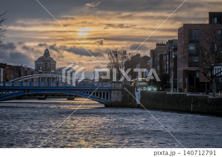 Dublin Ireland Cityscape Along River Liffey with Historic Bridges Waterfront Buildings  140712791