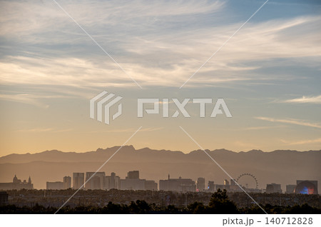 Las Vegas Nevada Skyline with Stratosphere Tower and Desert Mountain Backdrop Las Vegas Nevada Skyline with Stratosphere Tower and Desert Mountain Backdrop 140712828