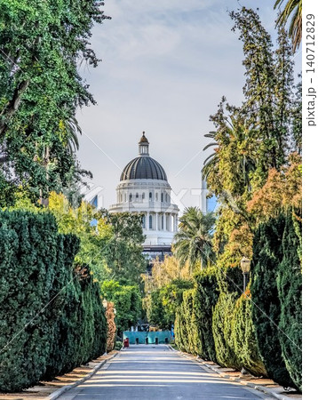 California State Capitol Framed Beautifully Through Tree Lined Sacramento Garden Path 140712829