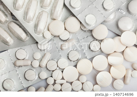 Different pills on white background 140714696
