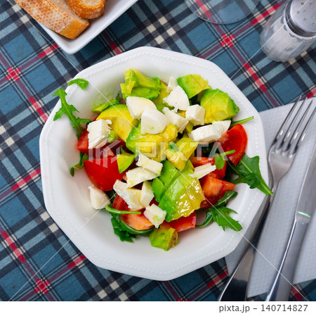 Healthy vegan arugula salad with avocado Healthy vegan arugula salad with avocado 140714827