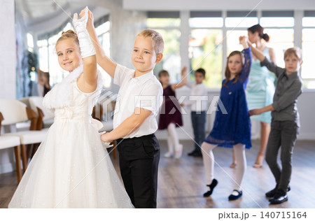 Classical dances performed by preteen children in festive clothes Classical dances performed by preteen children in festive clothes 140715164