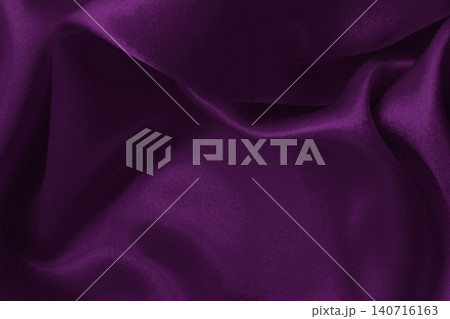 Purple fabric cloth texture for background and design art work, beautiful crumpled pattern of silk or linen. Purple fabric cloth texture for background and design art work, beautiful crumpled pattern of silk or linen. 140716163