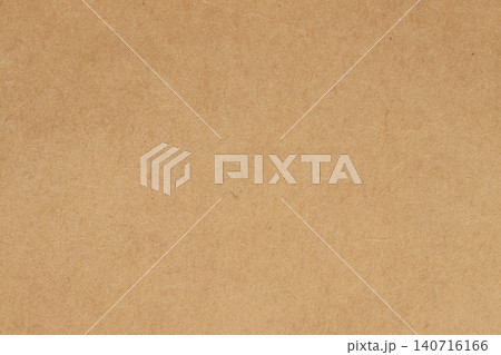 Brown cardboard sheet abstract background, texture of sepia color kraft paper with vintage pattern for design art work. 140716166