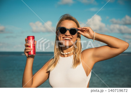 Bali, Indonesia, March 18, 2026: Coca-Cola drink at the beach 140719672