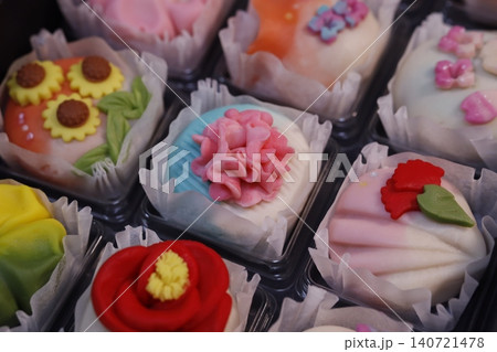 Colorful Assorted Pastries in Cupcake Liners Colorful Assorted Pastries in Cupcake Liners 140721478