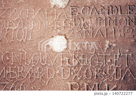 Historic engravings on stone wall of Strasbourg Cathedral, France Historic engravings on stone wall of Strasbourg Cathedral, France 140722277