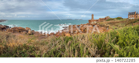 Mean Ruz lighthouse facing rough ocean near Tregastel Brittany France. Panoramic view Mean Ruz lighthouse facing rough ocean near Tregastel Brittany France. Panoramic view 140722285