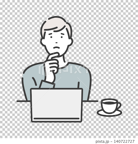 A young man thinking while looking at his computer. 140722727