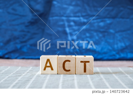 act, motivational word made of letters on wooden cubes act, motivational word made of letters on wooden cubes 140723642