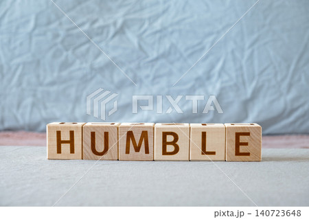 humble, motivational word made of letters on wooden cubes humble, motivational word made of letters on wooden cubes 140723648
