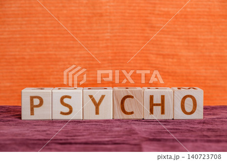 psycho, motivational word made of letters on wooden cubes psycho, motivational word made of letters on wooden cubes 140723708