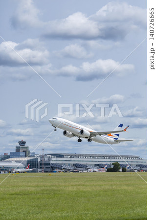 Passenger airplane taking off from Prague Airport Passenger airplane taking off from Prague Airport 140726665