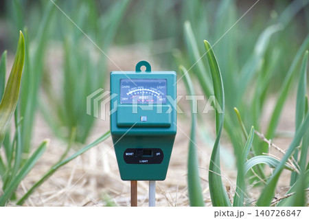 Gardening tool measures soil moisture, light, and pH levels for healthy plant growth Gardening tool measures soil moisture, light, and pH levels for healthy plant growth 140726847