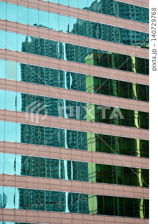 Windows of business building. Modern city building. Building abstract. Building background. Windows of business building. Modern city building. Building abstract. Building background. 140729768