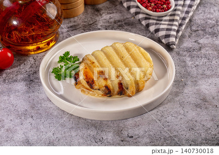 Grilled Halloumi Cheese on White Plate with Saffron Oil and Pink Peppercorns Grilled Halloumi Cheese on White Plate with Saffron Oil and Pink Peppercorns 140730018