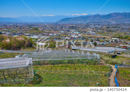 春の山梨県(甲州市,南アルプス市,甲府市,中央市,甲斐市など)と南アルプスの眺望 春の山梨県(甲州市,南アルプス市,甲府市,中央市,甲斐市など)と南アルプスの眺望 140730424