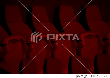 Empty chairs in the stadium. Empty seats in the stadium. Sport background pattern photo. Patterns of chairs in a theater. Seats background pattern photo. Empty chairs in the stadium. Empty seats in the stadium. Sport background pattern photo. Patterns of chairs in a theater. Seats background pattern photo. 140730574