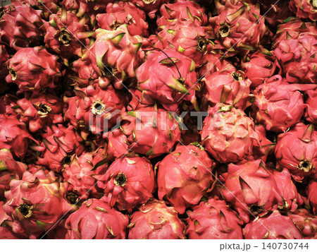 Pile of fresh exotic pink dragon fruit (pitaya) on display at a market. 140730744