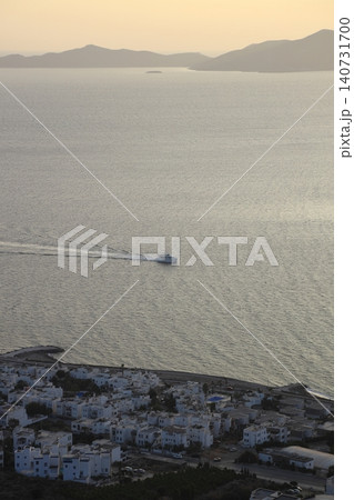 Seaside town of Turgutreis and spectacular sunsets. aerial view of islands and sea Seaside town of Turgutreis and spectacular sunsets. aerial view of islands and sea 140731700