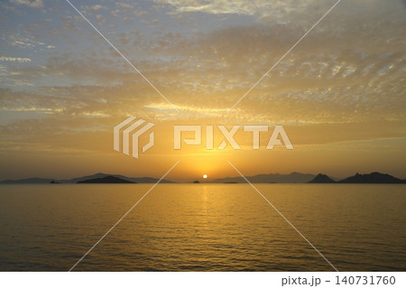 sunset on the beach. Seaside town of Turgutreis and spectacular sunsets. Selective Focus. sunset on the beach. Seaside town of Turgutreis and spectacular sunsets. Selective Focus. 140731760