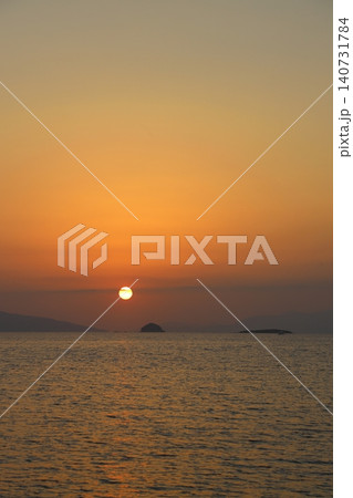 sunset on the beach. Seaside town of Turgutreis and spectacular sunsets. Selective Focus. sunset on the beach. Seaside town of Turgutreis and spectacular sunsets. Selective Focus. 140731784