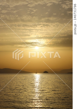 sunset on the beach. Seaside town of Turgutreis and spectacular sunsets. Selective Focus. sunset on the beach. Seaside town of Turgutreis and spectacular sunsets. Selective Focus. 140731786