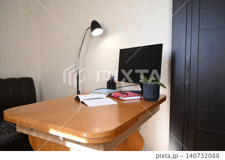Small office with desk and couch setup Small office with desk and couch setup 140732088
