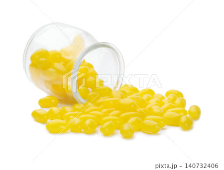 Tasty small lemon drops isolated on white Tasty small lemon drops isolated on white 140732406