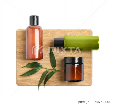Bottles with cosmetic products isolated on white, top view. Spa treatment Bottles with cosmetic products isolated on white, top view. Spa treatment 140732438