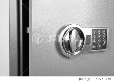 Grey steel safe with electronic lock, closeup Grey steel safe with electronic lock, closeup 140732476