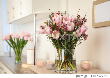 Beautiful bouquet with spring pink tulips on table indoors. Space for text 140732766