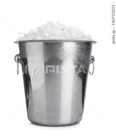 Metal bucket with ice cubes isolated on white Metal bucket with ice cubes isolated on white 140733033