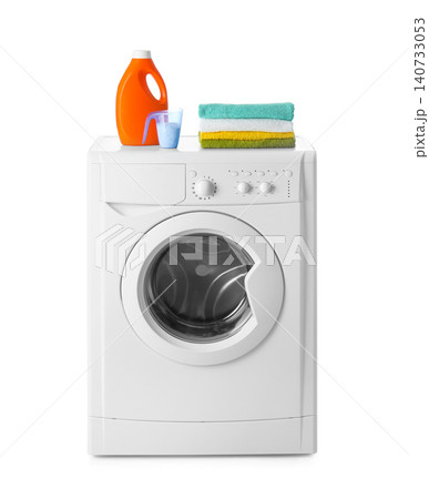 Modern washing machine, stack of towels and detergents on white background. Laundry day Modern washing machine, stack of towels and detergents on white background. Laundry day 140733053