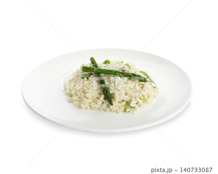 Delicious risotto with asparagus isolated on white Delicious risotto with asparagus isolated on white 140733087