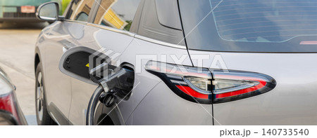 Electric car charging station. Hybrid car Electric charger station in the Car Park. 140733540