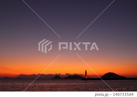 Seascape at sunshine. Lighthouse and sailings on the coast. Seaside town of Turgutreis and spectacular sunshine 140733584