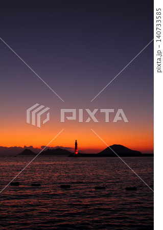 Seascape at sunshine. Lighthouse and sailings on the coast. Seaside town of Turgutreis and spectacular sunshine Seascape at sunshine. Lighthouse and sailings on the coast. Seaside town of Turgutreis and spectacular sunshine 140733585