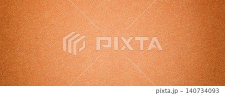Peach suede fabric background with matte microfiber texture, soft pastel orange felt surface with vignette in macro Peach suede fabric background with matte microfiber texture, soft pastel orange felt surface with vignette in macro 140734093
