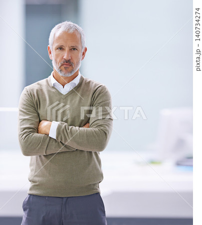 CEO, portrait and serious businessman with arms crossed in office, startup company or creative agency. Designer, entrepreneur and face of mature man for professional, management or development 140734274
