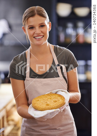 Pie, bake and portrait of woman in kitchen for lunch, dinner and supper in home with recipe. Cooking, happy and person with smile, dish and food for eating, wellness or nutrition for meal preparation 140734368