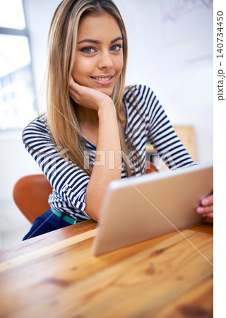 Business, tablet and portrait of woman at office desk for online browsing, internet or website for creative project. Professional, technology and female person for search, planning or connection Business, tablet and portrait of woman at office desk for online browsing, internet or website for creative project. Professional, technology and female person for search, planning or connection 140734450
