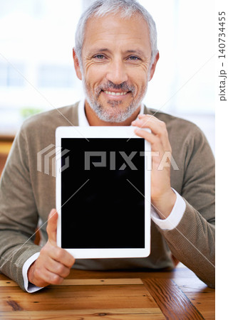 Portrait, tablet screen and happy man or manager showing mockup space at desk in office for marketing business. Face, display and person with technology for advertising or promo of mature consultant Portrait, tablet screen and happy man or manager showing mockup space at desk in office for marketing business. Face, display and person with technology for advertising or promo of mature consultant 140734455