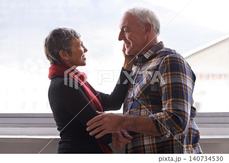 Mature couple, love and commitment in home or house, vacation and retirement holiday with happiness. Smile, elderly people and marriage or relationship for bonding, care and romance of woman and man 140734530