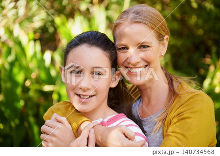 Girl, mother and hug in portrait in park with smile, support and outdoor bonding in nature together. Women, family and face of happy teen with mom in garden with love, weekend and trees in backyard Girl, mother and hug in portrait in park with smile, support and outdoor bonding in nature together. Women, family and face of happy teen with mom in garden with love, weekend and trees in backyard 140734568