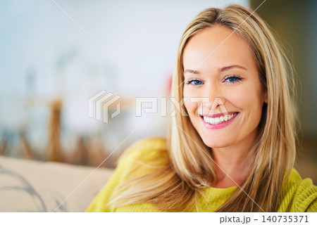 Happy, portrait and woman relax on a sofa in a house with confidence, chilling or good mood at home. Face, smile and female person in a living room resting with free time, break or comfort on weekend Happy, portrait and woman relax on a sofa in a house with confidence, chilling or good mood at home. Face, smile and female person in a living room resting with free time, break or comfort on weekend 140735371