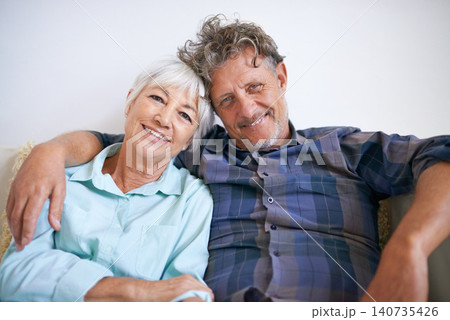 Old couple, hug and relax in portrait with happiness at home, love and security with comfort for bonding. Marriage, partner and retirement together with smile, trust and loyalty with people in lounge Old couple, hug and relax in portrait with happiness at home, love and security with comfort for bonding. Marriage, partner and retirement together with smile, trust and loyalty with people in lounge 140735426