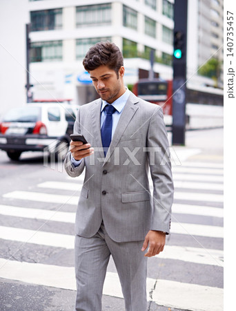 Smartphone, business man and walking in city for communication, social media or typing text massage. Professional, mobile phone and male employee in suit for networking, reading email or commute Smartphone, business man and walking in city for communication, social media or typing text massage. Professional, mobile phone and male employee in suit for networking, reading email or commute 140735457