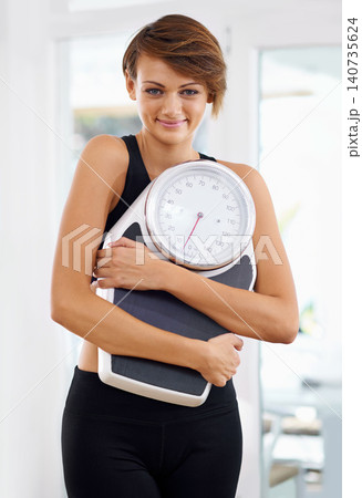 Fitness, portrait or happy woman in home with scale for body training or gym workout to lose weight. Wellness, monitor or confident female sports athlete in health club for exercise progress results 140735624